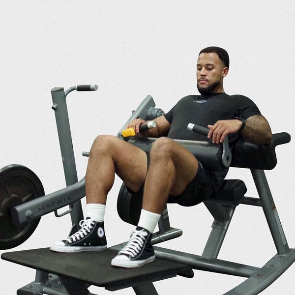 Machine Hip Thrust (Glute Bridge) - Exercise Guide | Motra