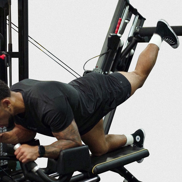 Machine Glute Kickback - Exercise Guide | Motra