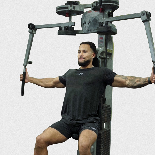 Machine Fly (Pec Dec) - Exercise Guide | Motra