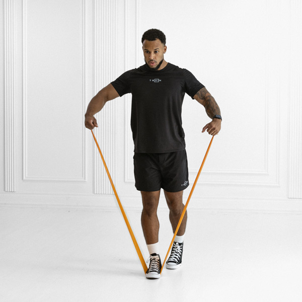 Resistance Band Lateral Raise - Exercise Guide | Motra
