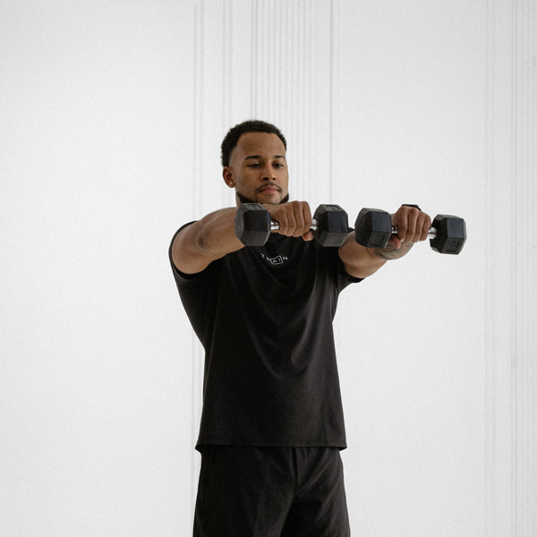 Dumbbell Front Raise - Exercise Guide | Motra