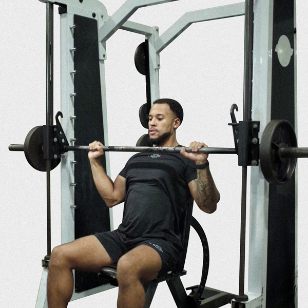 Smith Machine Shoulder Press - Exercise Guide | Motra