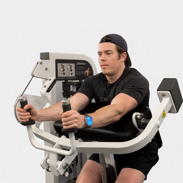 Machine Tricep Extension - Exercise Guide | Motra