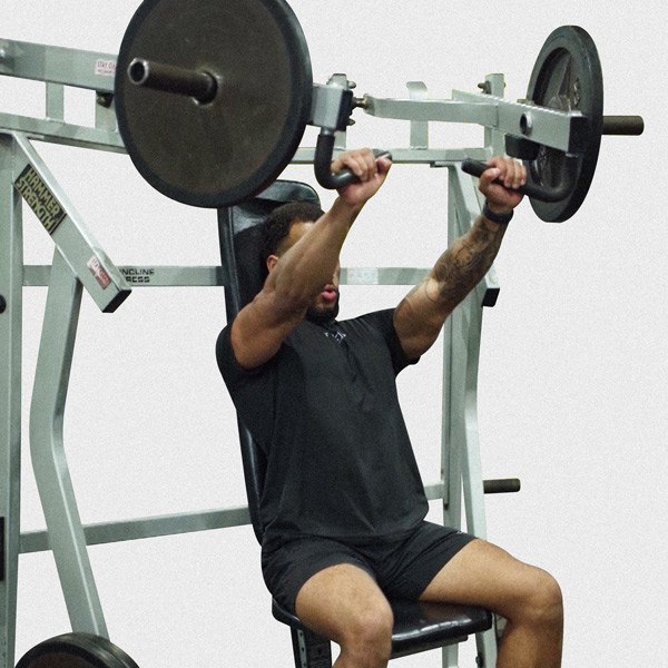 Machine Incline Bench Press - Exercise Guide | Motra